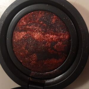 Laura Geller  rich rust eye rimz. brand new.